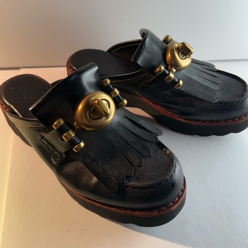 Coach Black Leather Clogs with Gold Turnlock Buckle and Kielte Trim
